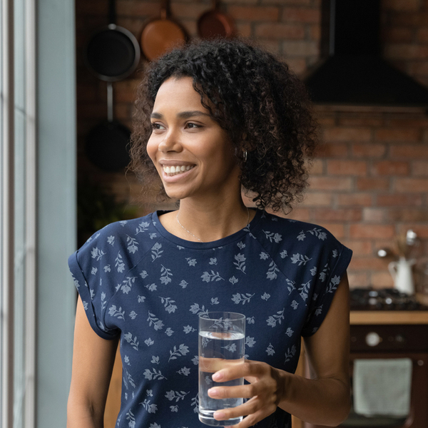 Woman with a Glass of Water